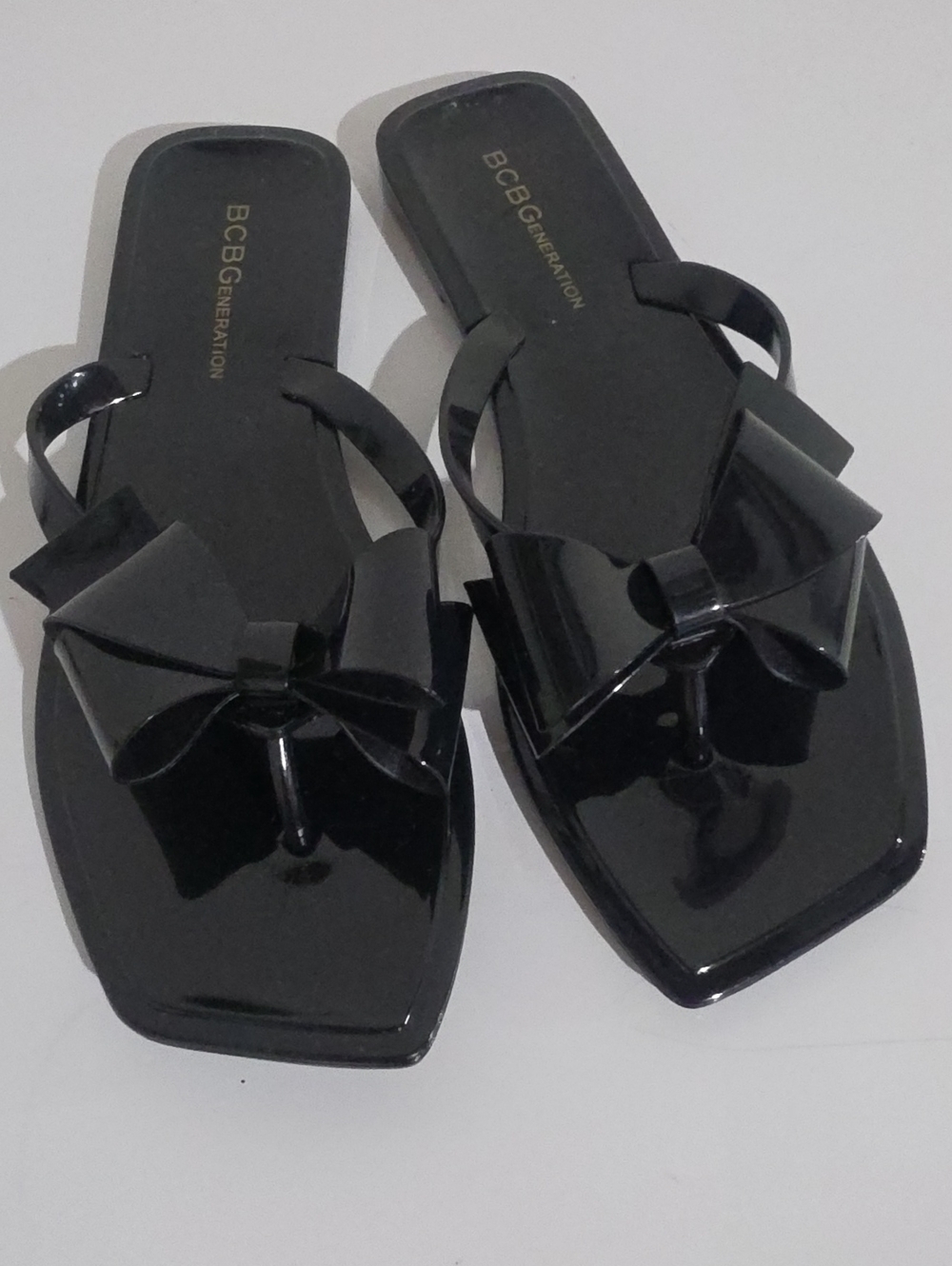 BCBGeneration Black Patent Bow Toe-Thong Sandals